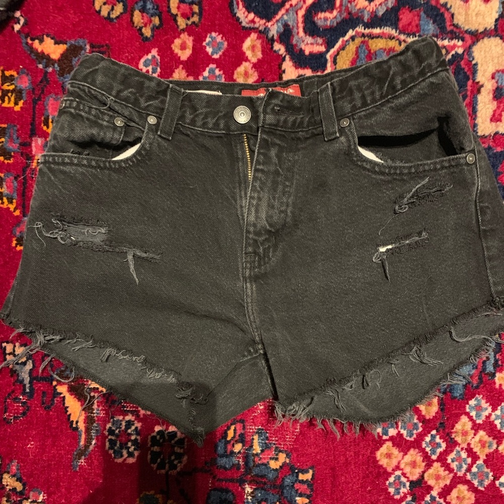 Black ripped shorts